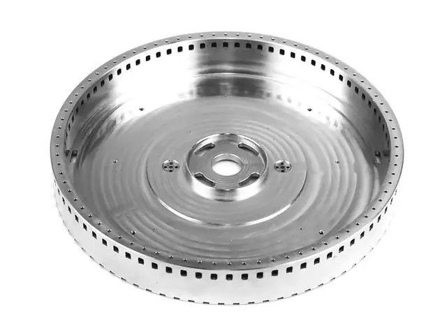 Turned aluminium disc with radial slots, indexed on the rotary