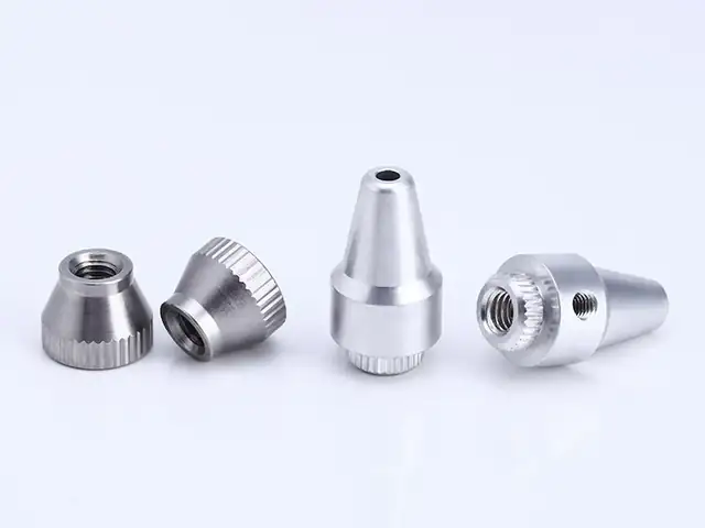 Small turned and knurled stainless fittings, batch run